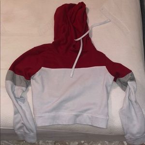 Red, white, grey hoodie.